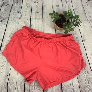 Coral pink Nike shorts